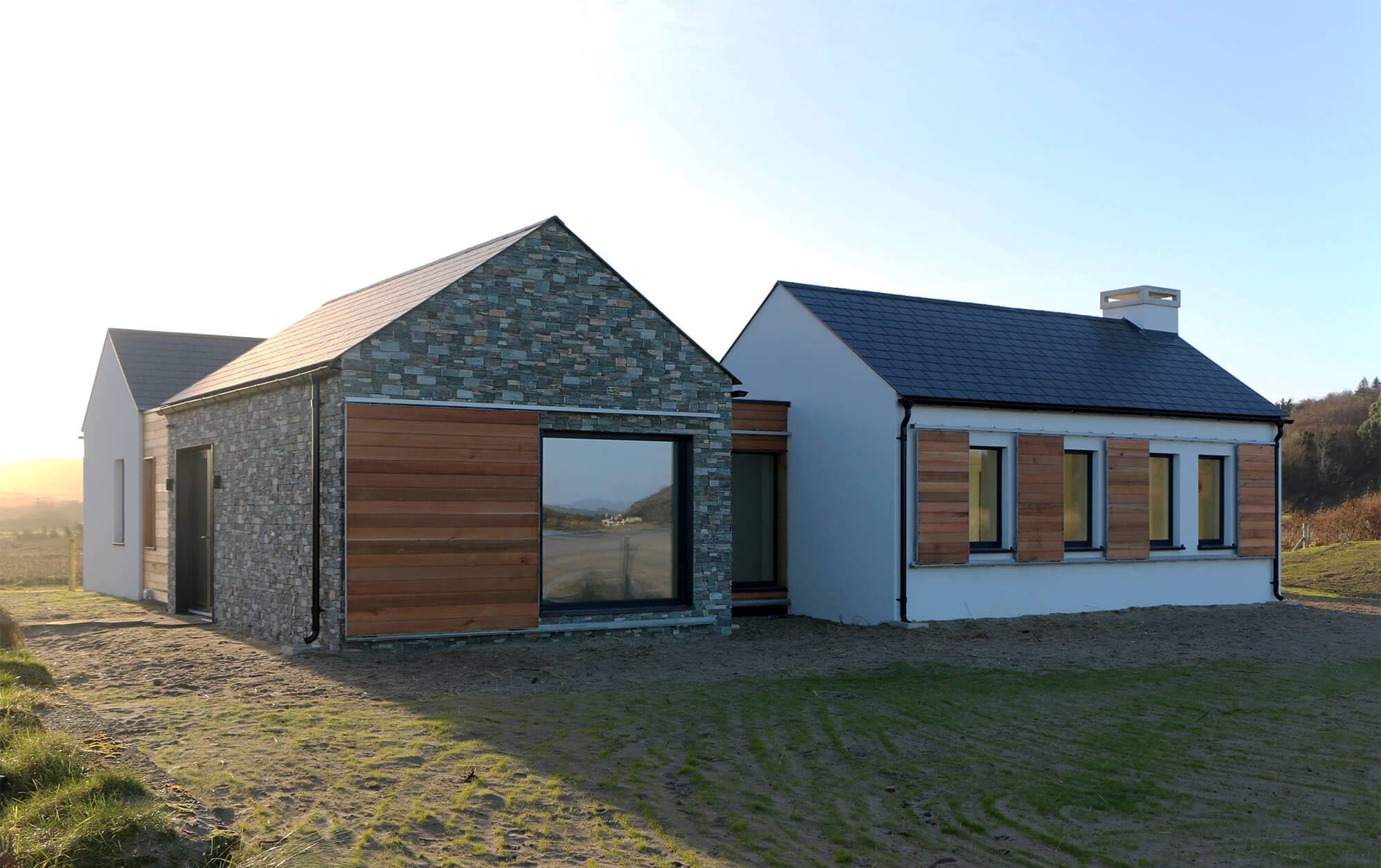 Marblehill Strand Cottage with its timber shutters slid open, windows uncovered